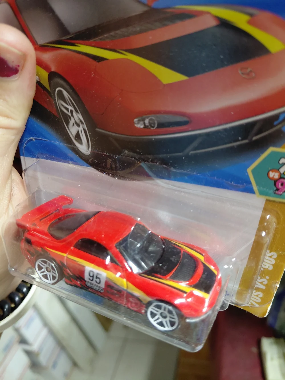 the Hot Wheels '95 Mazda RX-7 Drift from the 2025 '70s vs '90s series (9/10, num